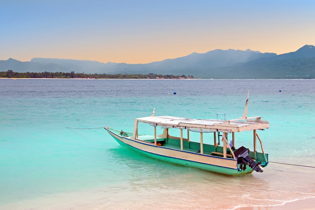 Traditional boat on Gili Meno island beach, Indonesia Asia at sunrise